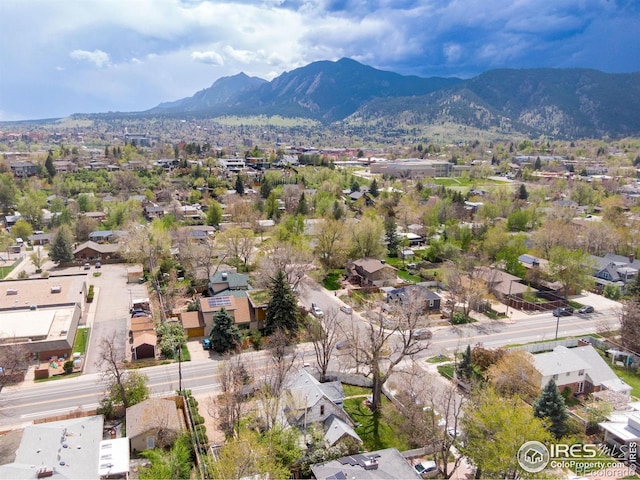 drone / aerial view with a residential view and a mountain view