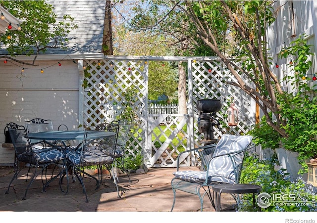 view of patio / terrace with fence