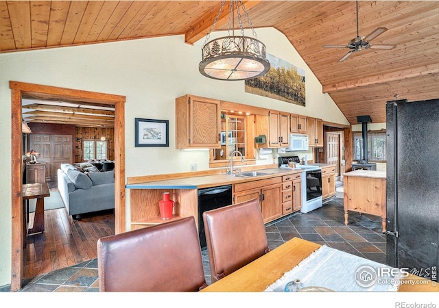 kitchen featuring black appliances, wooden ceiling, a sink, light countertops, and a ceiling fan