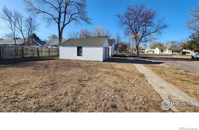 401 Park St, Sterling, CO 80751 - view of yard featuring fence and a residential view