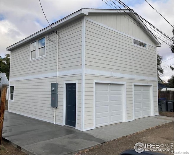 view of property exterior with a garage