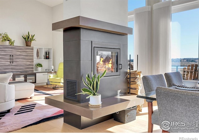 11251 Lookout Dr, Longmont, CO 80504 - living room with wood finished floors and a high ceiling