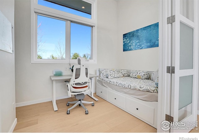 11251 Lookout Dr, Longmont, CO 80504 - bedroom with light wood-style floors and baseboards