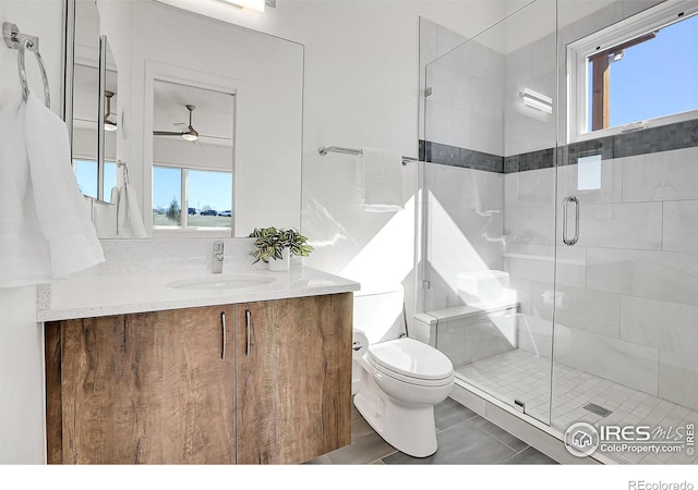 11251 Lookout Dr, Longmont, CO 80504 - full bath featuring toilet, healthy amount of natural light, and a shower stall