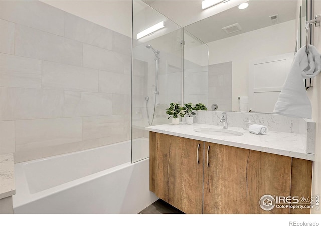 11251 Lookout Dr, Longmont, CO 80504 - full bathroom featuring vanity and shower / bathtub combination
