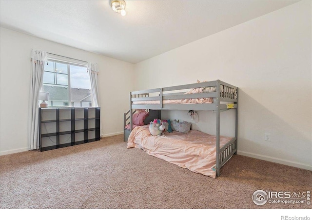 4355 24th Street Rd Unit 803, Greeley, CO 80634 - bedroom with carpet flooring and baseboards