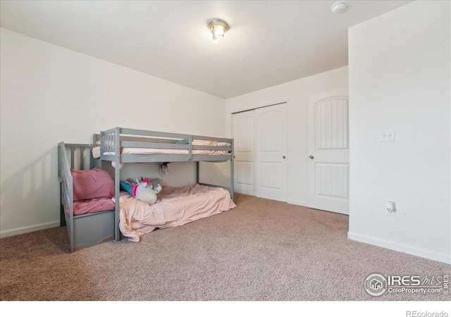 4355 24th Street Rd Unit 803, Greeley, CO 80634 - carpeted bedroom with baseboards and a closet