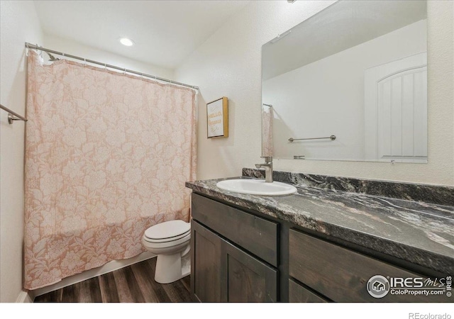 4355 24th Street Rd Unit 803, Greeley, CO 80634 - bathroom with toilet, wood finished floors, shower / tub combo, and vanity