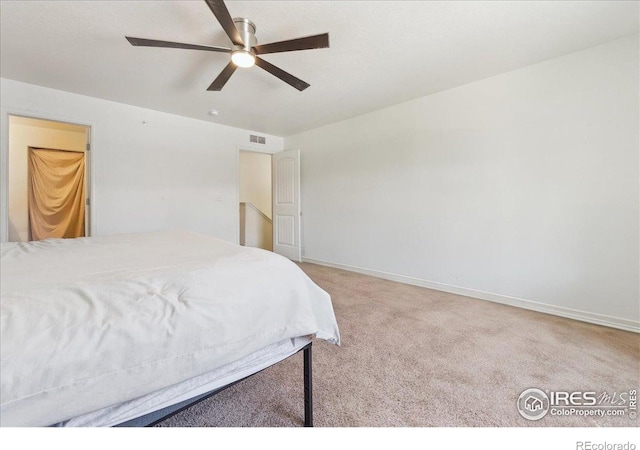 4355 24th Street Rd Unit 803, Greeley, CO 80634 - carpeted bedroom featuring a ceiling fan, baseboards, and visible vents