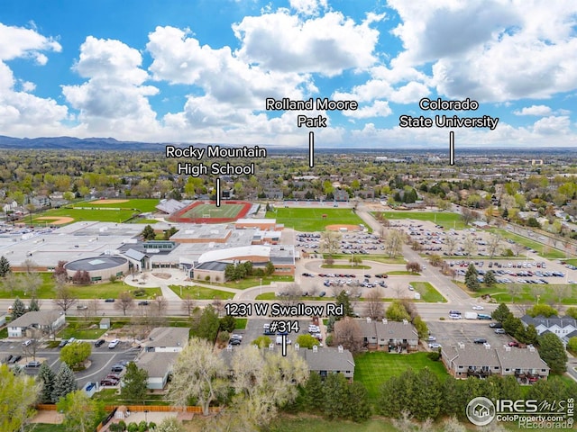 1231 W Swallow Rd Unit 314, Fort Collins, CO 80526 - drone / aerial view featuring a mountain view