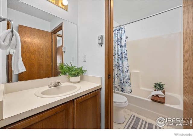 1231 W Swallow Rd Unit 314, Fort Collins, CO 80526 - bathroom with toilet, tile patterned floors, shower / bath combo with shower curtain, and vanity