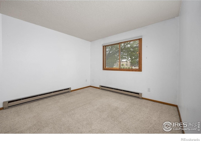 1231 W Swallow Rd Unit 314, Fort Collins, CO 80526 - empty room with baseboards, carpet flooring, and a baseboard heating unit
