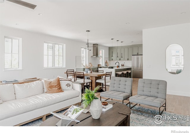 914 Eldorado Ln, Louisville, CO 80027 - living area featuring recessed lighting, baseboards, and light wood-type flooring