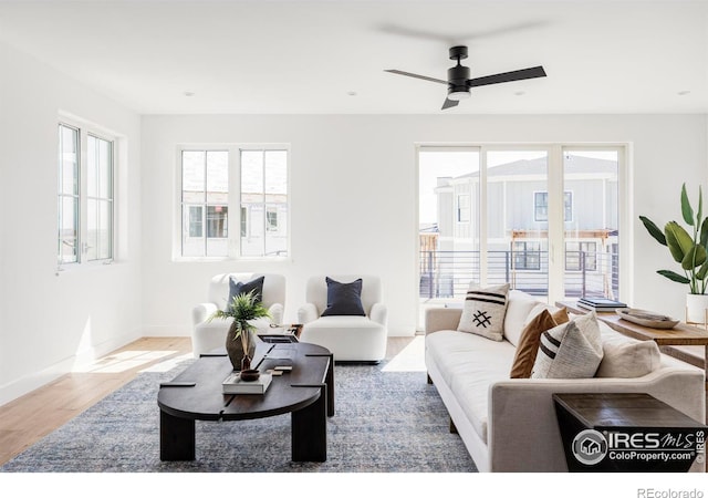 914 Eldorado Ln, Louisville, CO 80027 - living area featuring baseboards, a ceiling fan, and wood finished floors