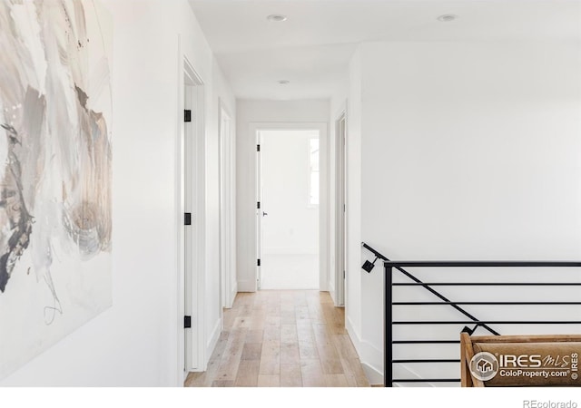 914 Eldorado Ln, Louisville, CO 80027 - hall with recessed lighting, baseboards, and light wood finished floors