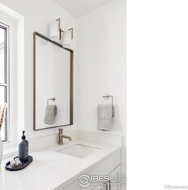 914 Eldorado Ln, Louisville, CO 80027 - bathroom with plenty of natural light and vanity
