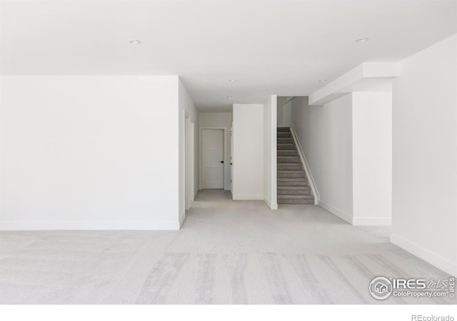 914 Eldorado Ln, Louisville, CO 80027 - empty room with baseboards, light carpet, and stairs
