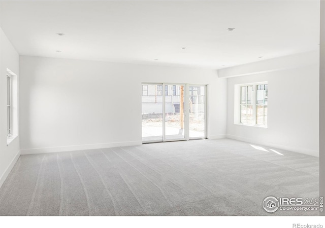 914 Eldorado Ln, Louisville, CO 80027 - carpeted empty room with baseboards and a healthy amount of sunlight
