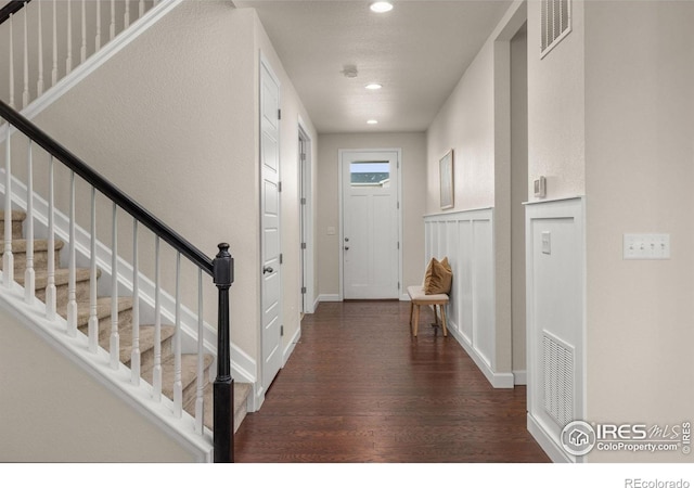 5845 Shadow Creek Ct, Windsor, CO 80528 - foyer entrance featuring wood finished floors, recessed lighting, stairway, and baseboards