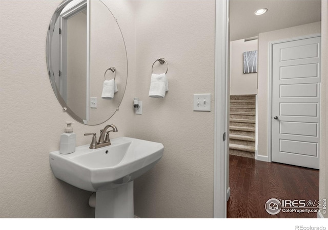 5845 Shadow Creek Ct, Windsor, CO 80528 - bathroom featuring wood finished floors and recessed lighting