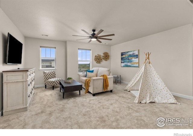 5845 Shadow Creek Ct, Windsor, CO 80528 - living room featuring a ceiling fan, light colored carpet, and baseboards