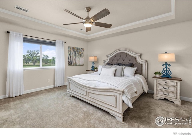 5845 Shadow Creek Ct, Windsor, CO 80528 - bedroom with carpet flooring, crown molding, baseboards, and a tray ceiling