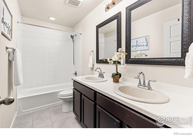 5845 Shadow Creek Ct, Windsor, CO 80528 - bathroom featuring double vanity, tile patterned flooring, toilet, shower / bathtub combination, and recessed lighting
