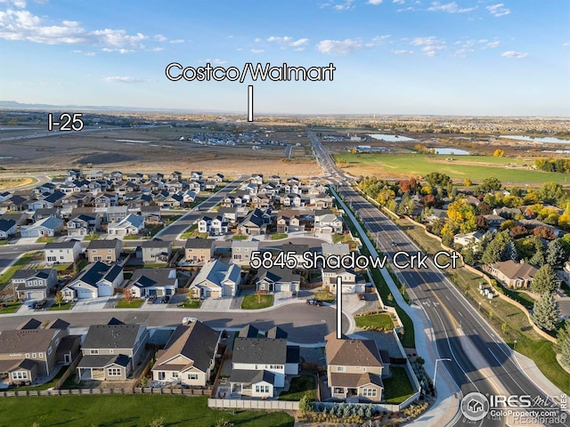 5845 Shadow Creek Ct, Windsor, CO 80528 - aerial overview of property's location with nearby suburban area and a nearby body of water