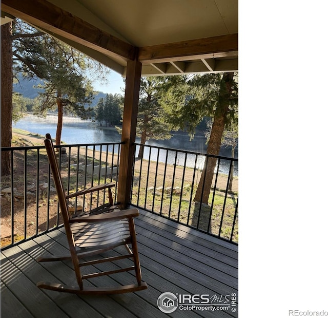 565 Hemlock Dr, Lyons, CO 80540 - wooden terrace with a water view
