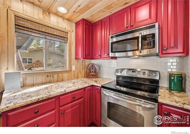 565 Hemlock Dr, Lyons, CO 80540 - kitchen featuring light stone counters, appliances with stainless steel finishes, backsplash, and wooden ceiling