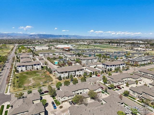 drone / aerial view featuring a mountain view