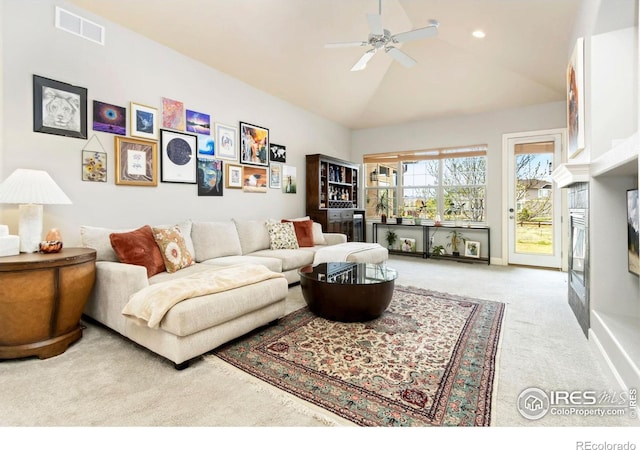 1992 Vineyard Dr, Windsor, CO 80550 - living area with visible vents, carpet floors, lofted ceiling, ceiling fan, and recessed lighting