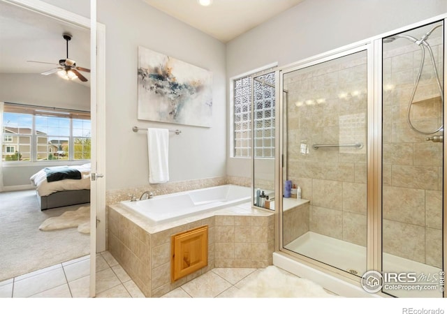 1992 Vineyard Dr, Windsor, CO 80550 - bathroom with ceiling fan, connected bathroom, a bath, tile patterned floors, and a stall shower