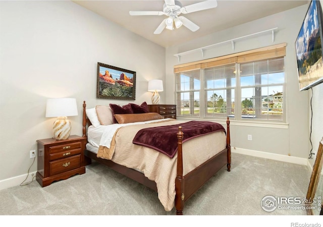 1992 Vineyard Dr, Windsor, CO 80550 - bedroom with baseboards, a ceiling fan, and light carpet