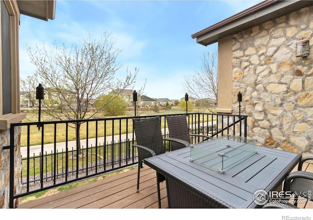 1992 Vineyard Dr, Windsor, CO 80550 - wooden terrace with a residential view