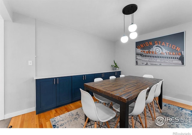 9261 Julian Way, Westminster, CO 80031 - dining room featuring baseboards and light wood-type flooring