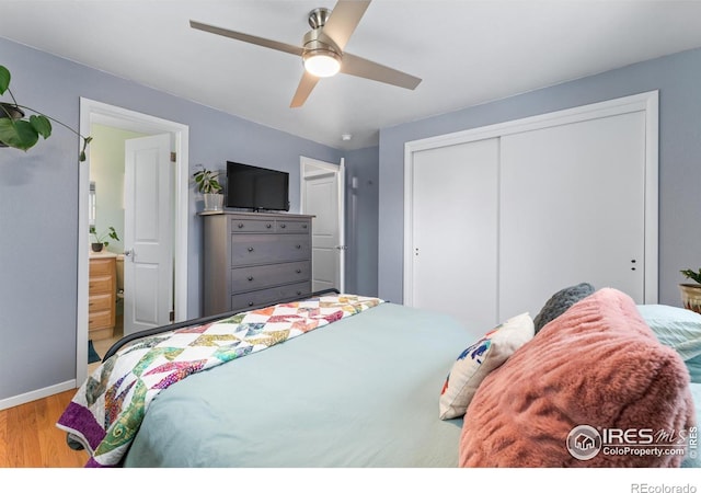 9261 Julian Way, Westminster, CO 80031 - bedroom featuring a closet, a ceiling fan, baseboards, and wood finished floors