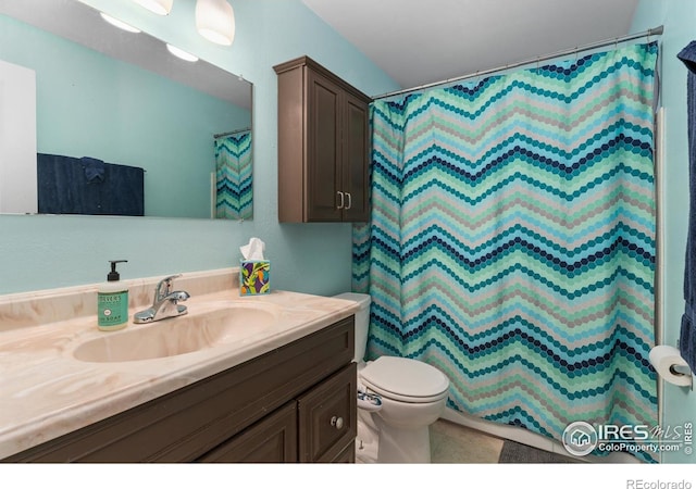 9261 Julian Way, Westminster, CO 80031 - full bath featuring toilet, a shower with curtain, and vanity