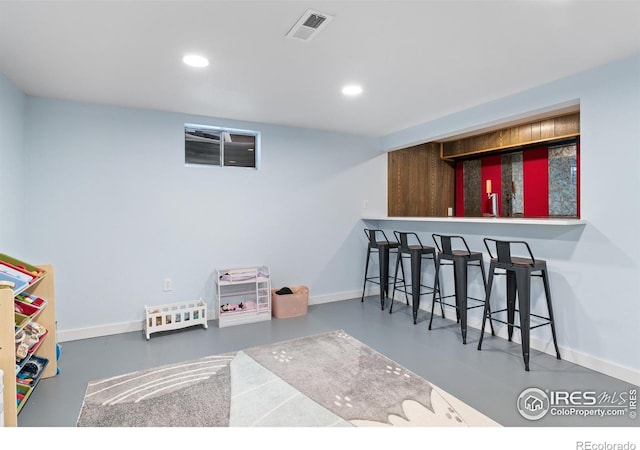 9261 Julian Way, Westminster, CO 80031 - rec room with recessed lighting, baseboards, visible vents, and bar area