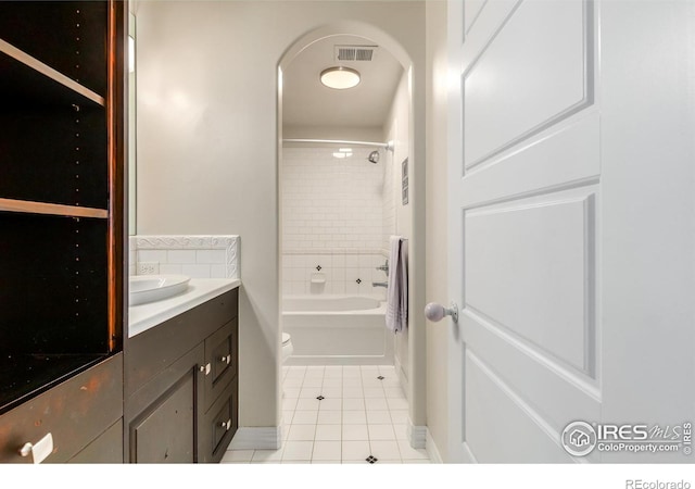 full bath featuring visible vents, vanity, toilet, shower / bathing tub combination, and tile patterned floors