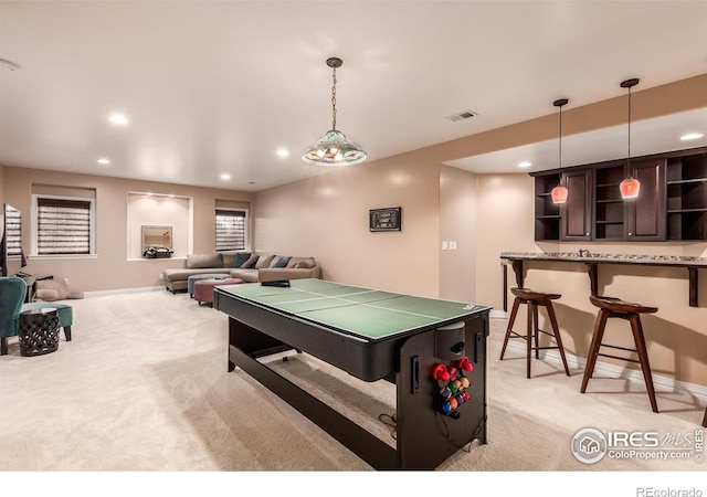 game room featuring recessed lighting, baseboards, light colored carpet, and visible vents