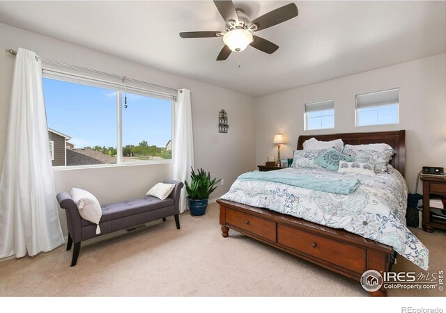 3803 Peach St, Wellington, CO 80549 - bedroom featuring light colored carpet and ceiling fan