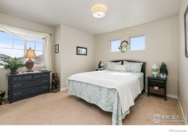 3803 Peach St, Wellington, CO 80549 - bedroom featuring light carpet and baseboards