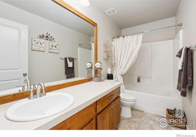 3803 Peach St, Wellington, CO 80549 - full bath featuring vanity, toilet, shower / bath combo, and tile patterned flooring