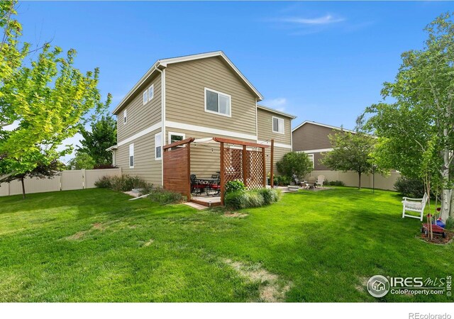 3803 Peach St, Wellington, CO 80549 - back of house with a patio
