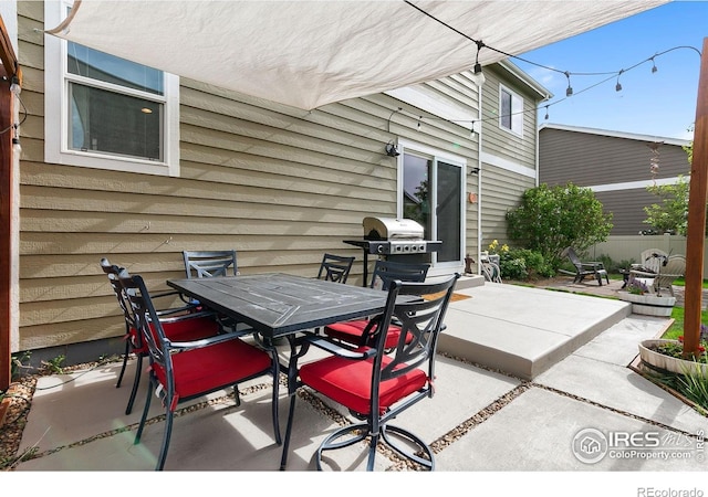 3803 Peach St, Wellington, CO 80549 - view of patio with outdoor dining space and area for grilling
