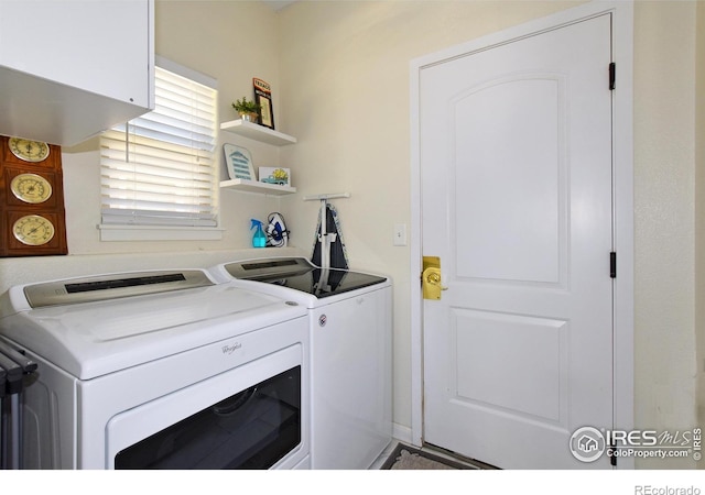 laundry room with laundry area and washing machine and clothes dryer