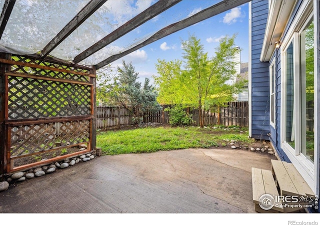 view of patio / terrace featuring a deck and a fenced backyard