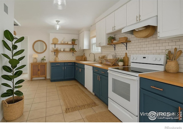 405 Maple St, Fort Morgan, CO 80701 - kitchen featuring blue cabinetry, open shelves, white appliances, and a sink