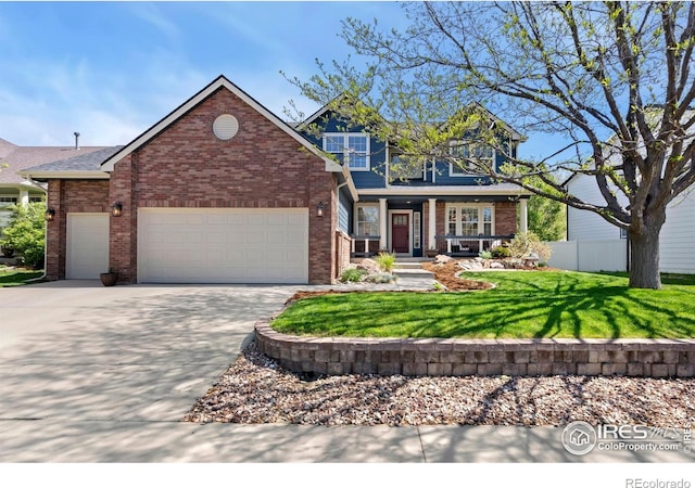 view of front of property featuring covered porch, brick siding, driveway, and a garage
